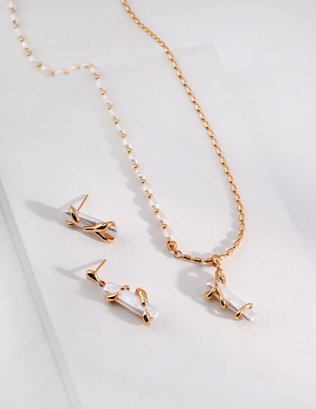 Fluid Baroque Pearl Stud Earrings in Gold and Sterling Silver | BARØ