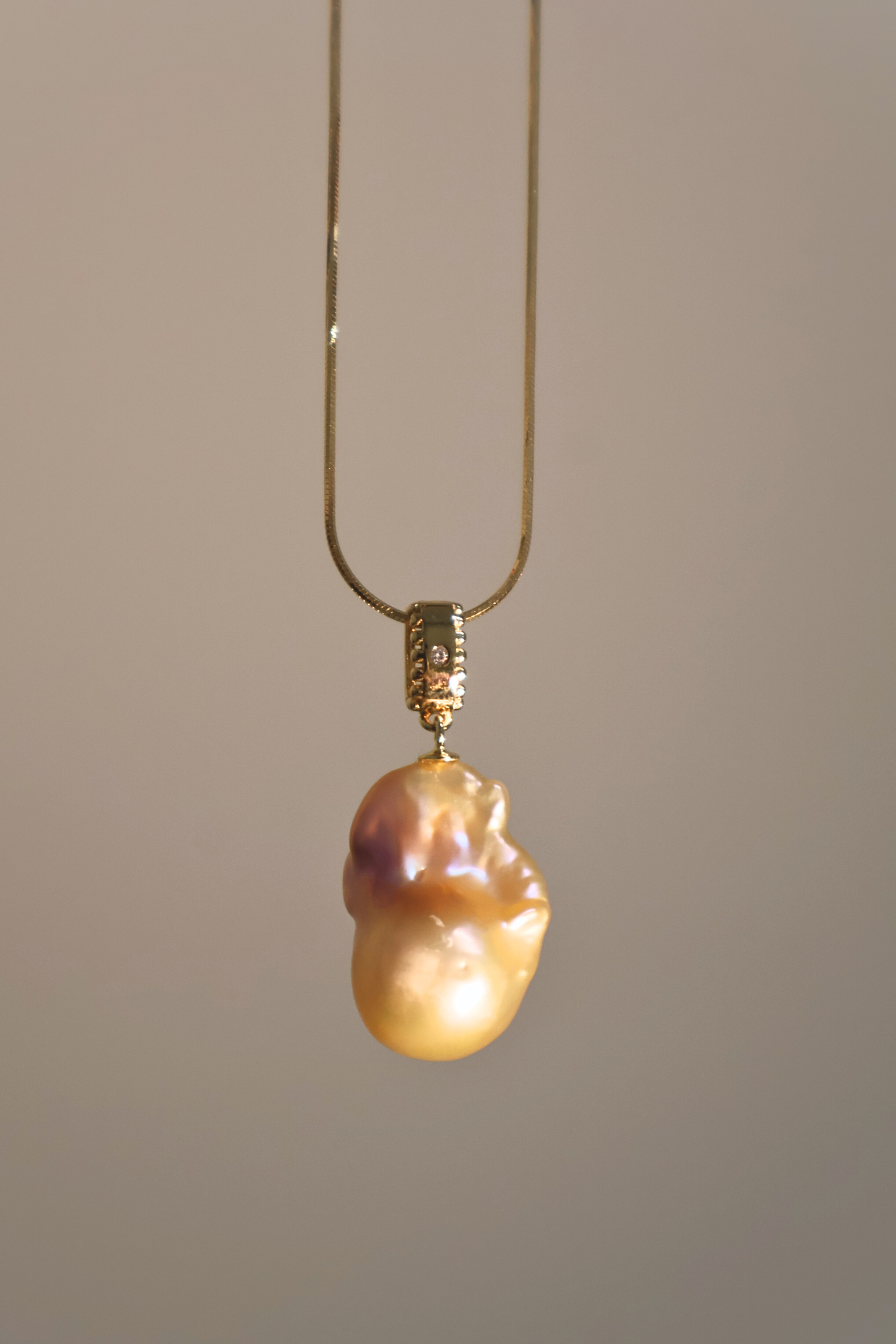 Iridescent Glow – Petite Baroque Pearl Pendant on Soft 18K Gold Chain