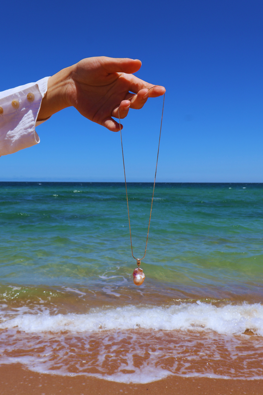 Iridescent Glow – Petite Baroque Pearl Pendant on Soft 18K Gold Chain