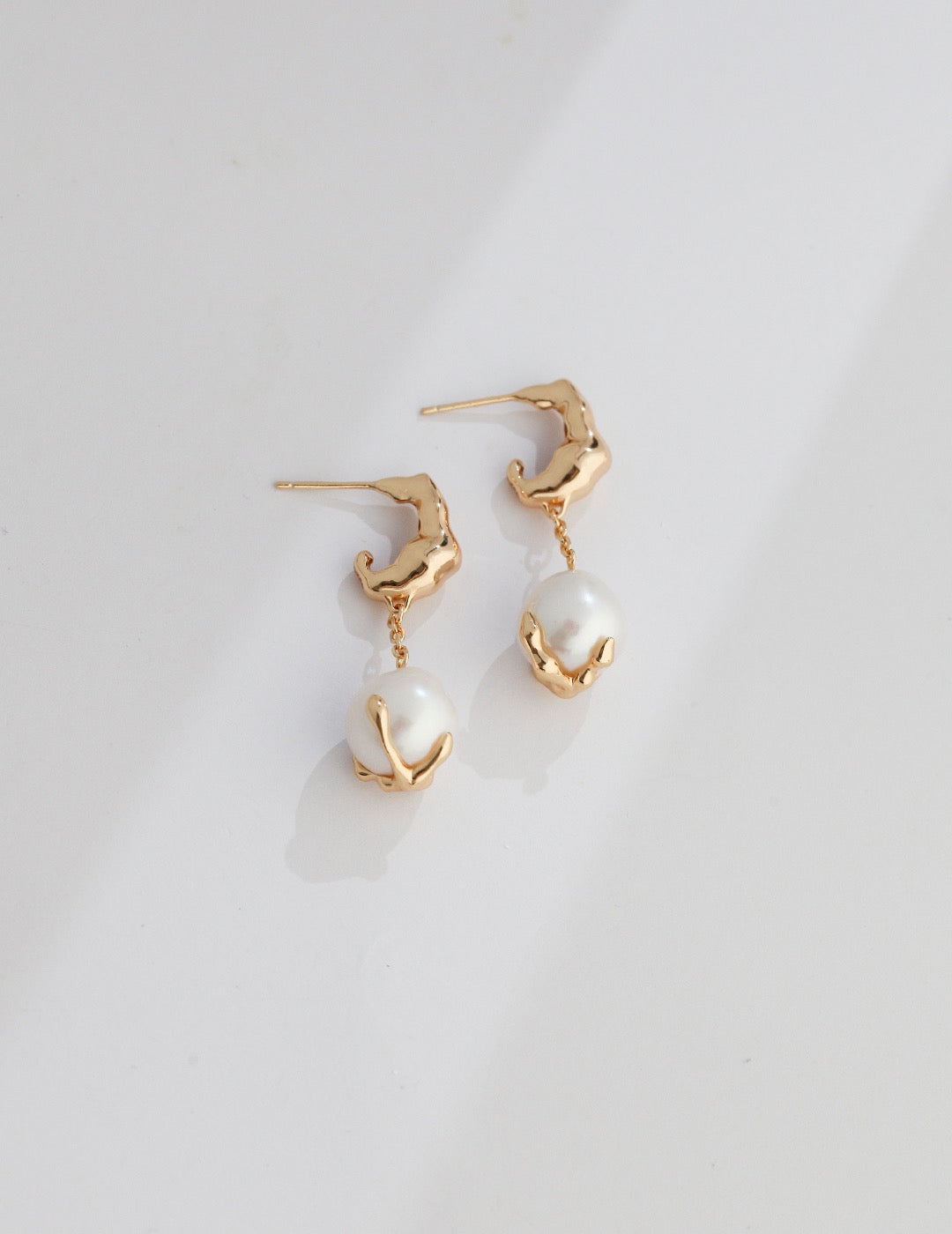 Fluid Sculptural Pearl Drop Earrings in Gold and Silver | BARØ