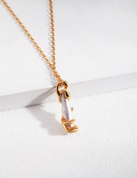 Embrace Baroque Pearl Pendant Necklace in Silver and Gold | BARØ